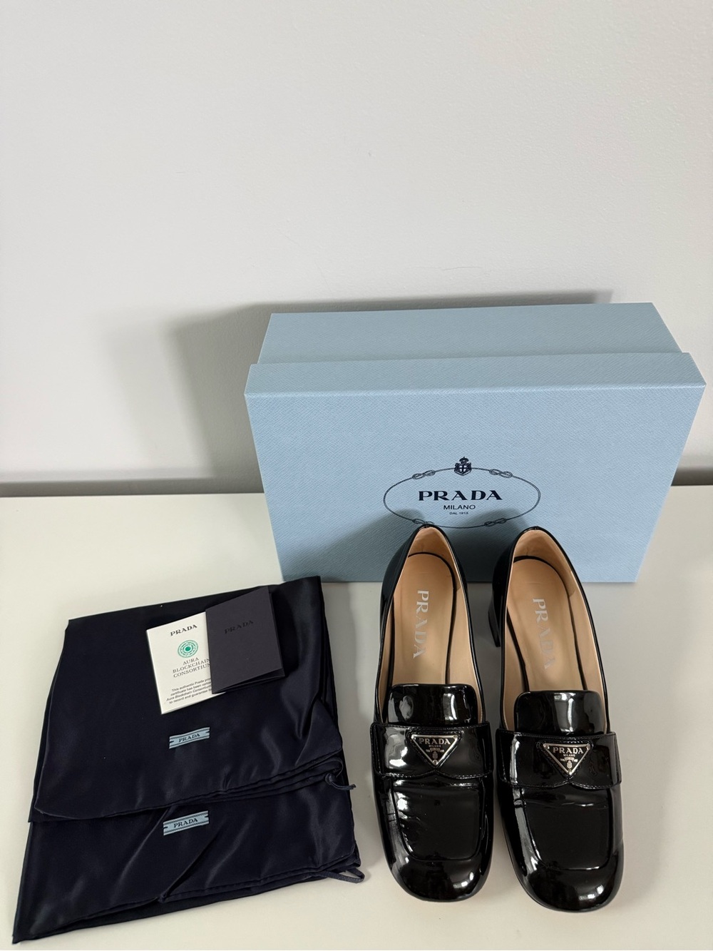 Prada 45MM Black Patent Leather Heeled
Loafers, Size 36.5